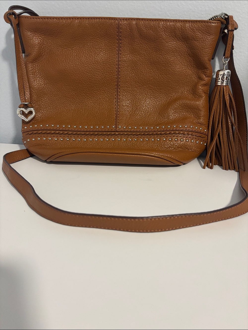 Brighton Womenβs Pebbled Leather Crossbody Luggage Brown